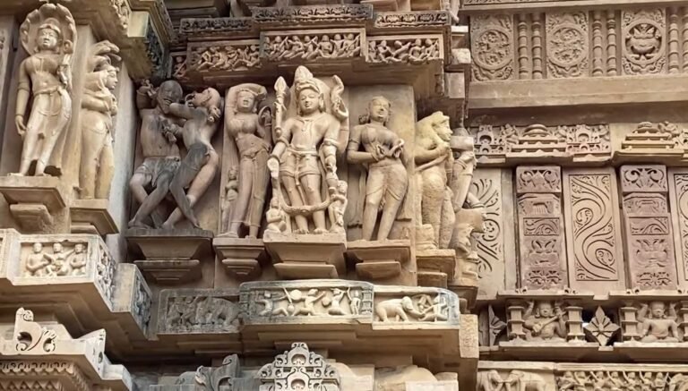Rows of finely carved figures on a Khajuraho temple