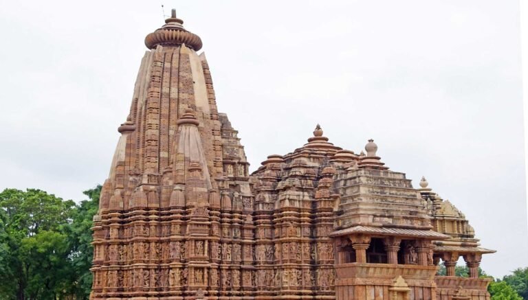 A Khajuraho temple under a clear winter sky